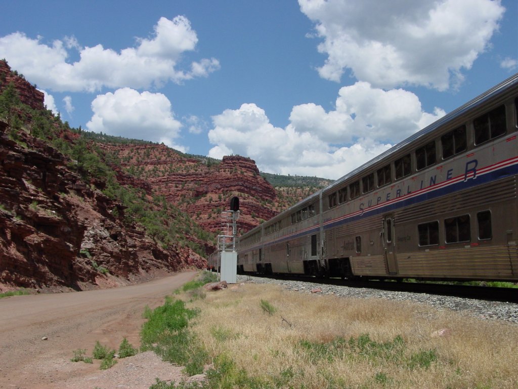 Colorado River Road at left, Amtrak at right. Old Rio Grande route between Moffat Tunnel and Dotsero, just south of Burns, Colorado.