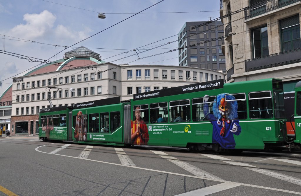 Da bei den Basler Verkehrsbetrieben auch mnnliche Tram- und Busfahrer gesucht werden, wirbt der Be 4/6S 678 mit mnnlichen Aufklebern. Die Aufnahme stammt vom 12.06.2013.
