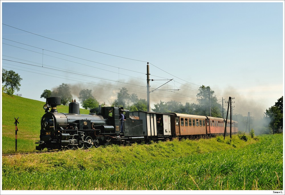 Dampflok Mh.6 mit dem Panoramic 760 alias R19259 nach Mariazell. Hier bei Kammerhof, 4.7.2010.