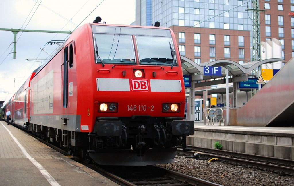 DB 146 110-2 mit RE 31011 nach Basel Bad Bf am 26.07 2010 in Hauptbahnhof Freiburg (Brsg).