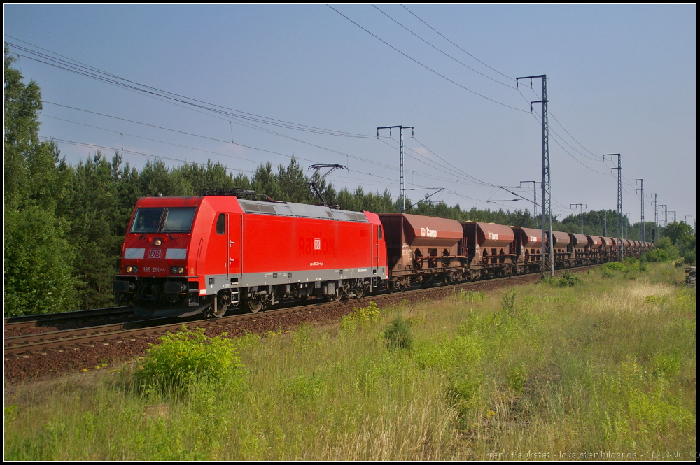DB 185 214 mit Facns-Wagen und feinem Kies am 20.06.2013 in der Berliner Wuhlheide