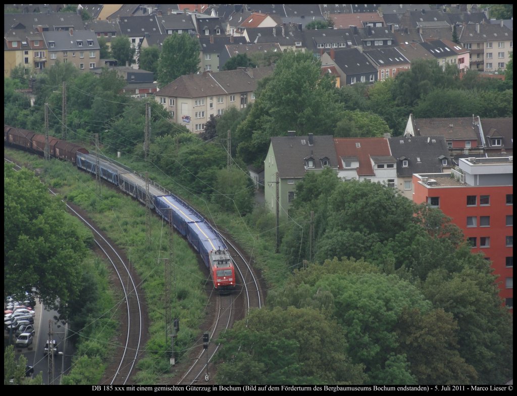 DB 185 xxx mit einem gemischten Gterzug in Bochum (Bild auf dem Frderturm des Bergbaumuseums Bochum endstanden) (07.07.2011)