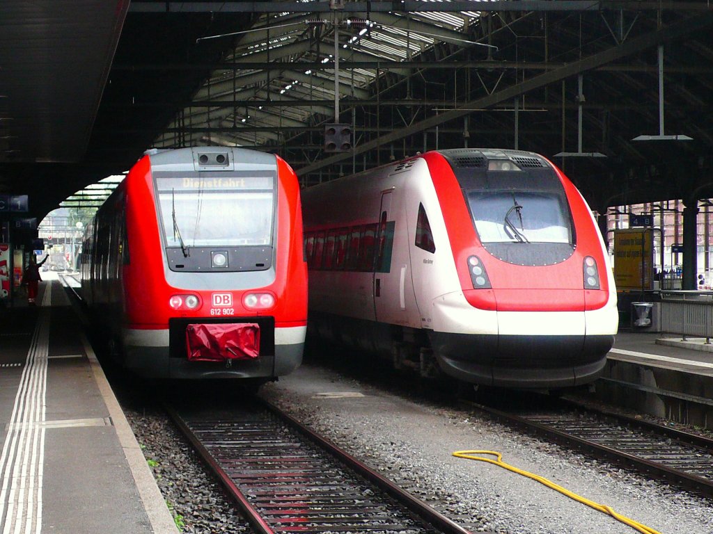 DB Messzug 612 901/902 in Bahnhof St. Gallen neben ein ICN (William Barbey 500 041) der SBB am 04.06.2012