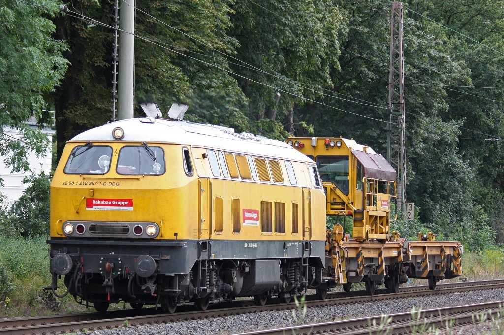 DBG/Bahnbaugruppe 218 287 am 2.8.12 mit einem SLW auf dem Weg nach Duisburg-Entenfang bei der Durchfahrt durch Ratingen-Lintorf.