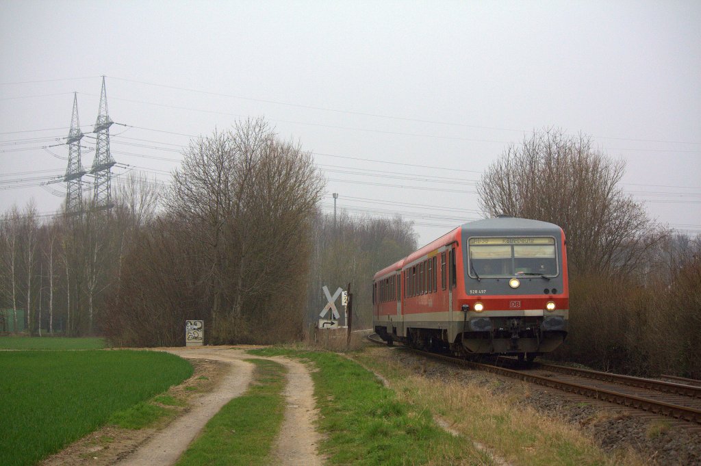Der 628 497 fuhr am 17.03.2012 als RB38 von Neuss nach Kln Messe-Deutz durch Zieverich.