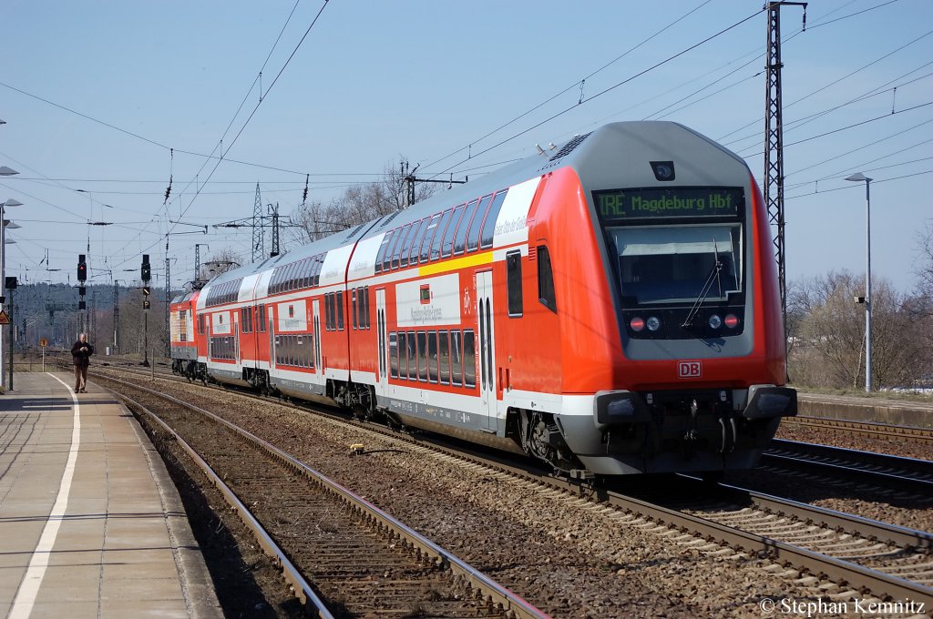 Der IRE25 (IRE 4276) nach Magdeburg bei der Durchfahrt in Saarmund. Gezogen hatte die 112 139. 29.03.2011