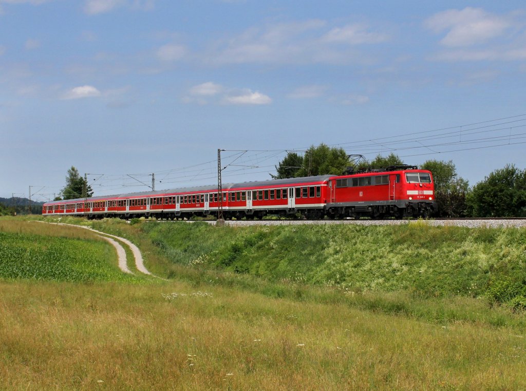Die 111 035 mit einer RB nach Salzburg am 23.06.2012 unterwegs bei Ostermnchen.