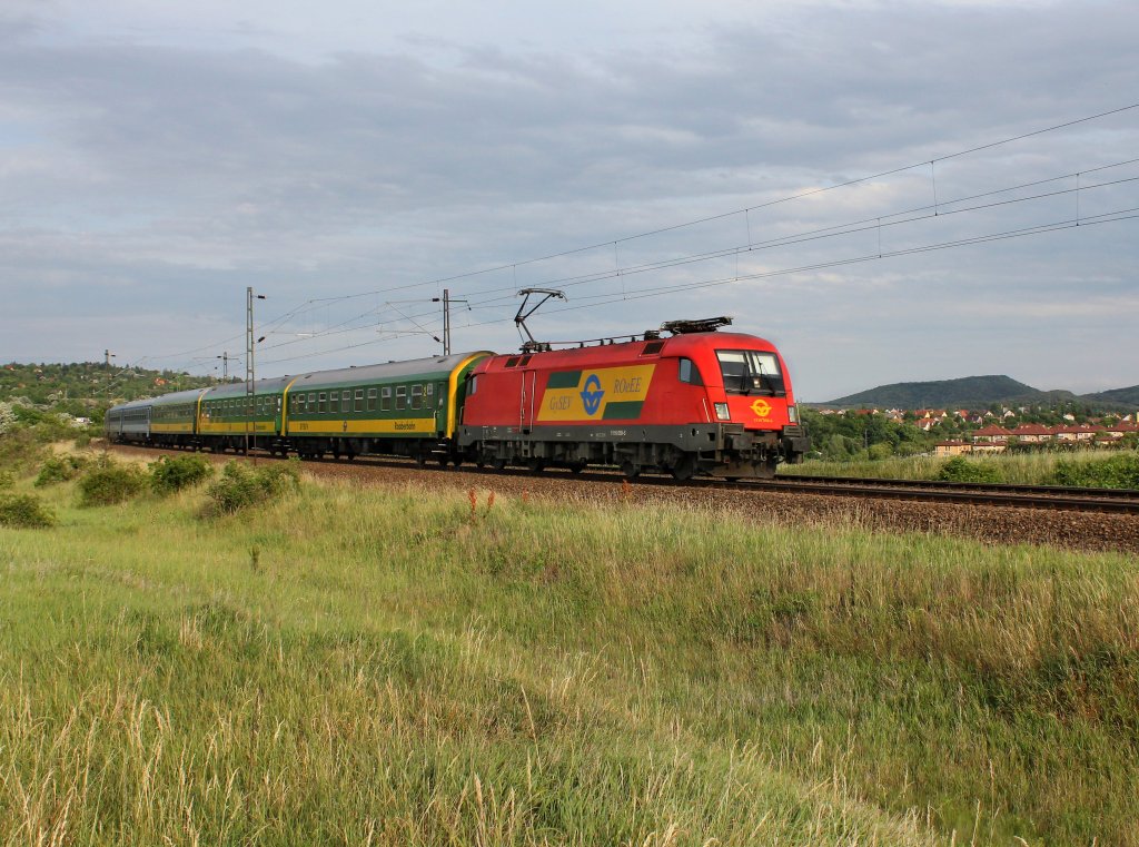 Die 1116 059 mit einem IC nach Sopron am 09.06.2012 unterwegs bei Biatorbgy.