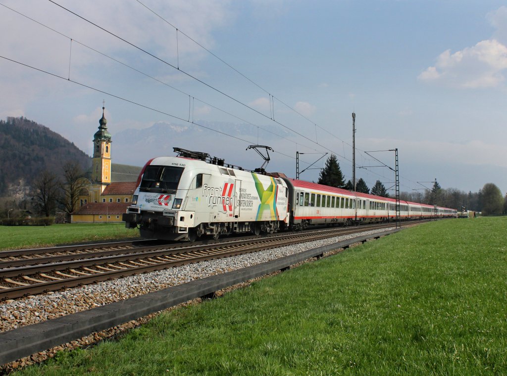 Die 1116 130 mit einem OIC nach Wien am 21.04.2013 unterwegs bei Niederaudorf.