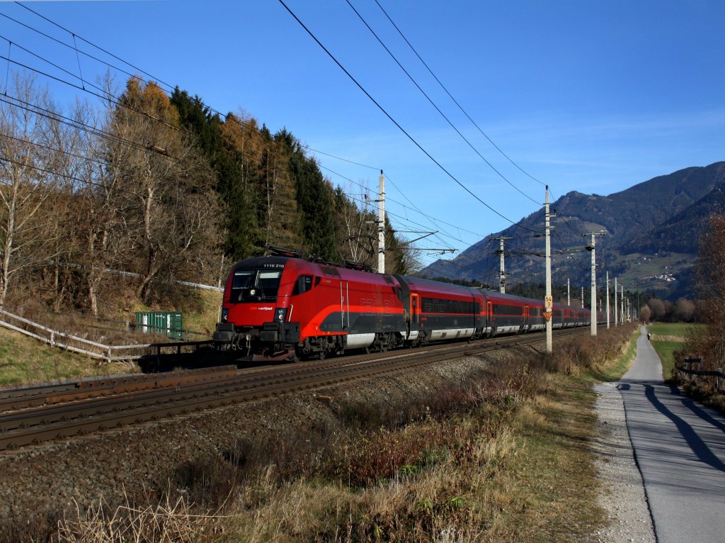 Die 1116 210 mit einem RJ am 19.11.2011 unterwegs bei Terfens.