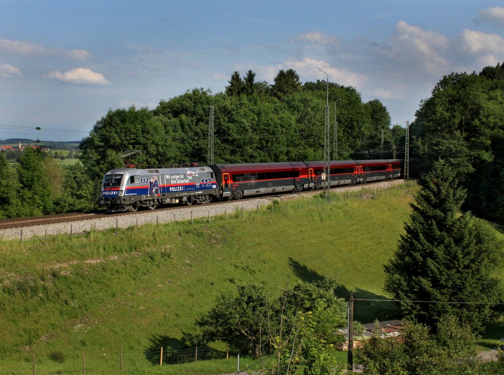 Die 1116 250 mit einem RJ am 23.06.2012 unterwegs bei Aling.