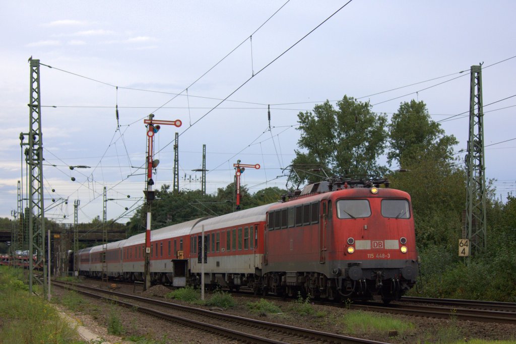 Die 115 448-3 fuhr am 11.09.2011 durch Kln Kalk.