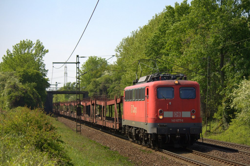 Die 140 677-6 fuhr am 07.05.2011 durch Ahlten.