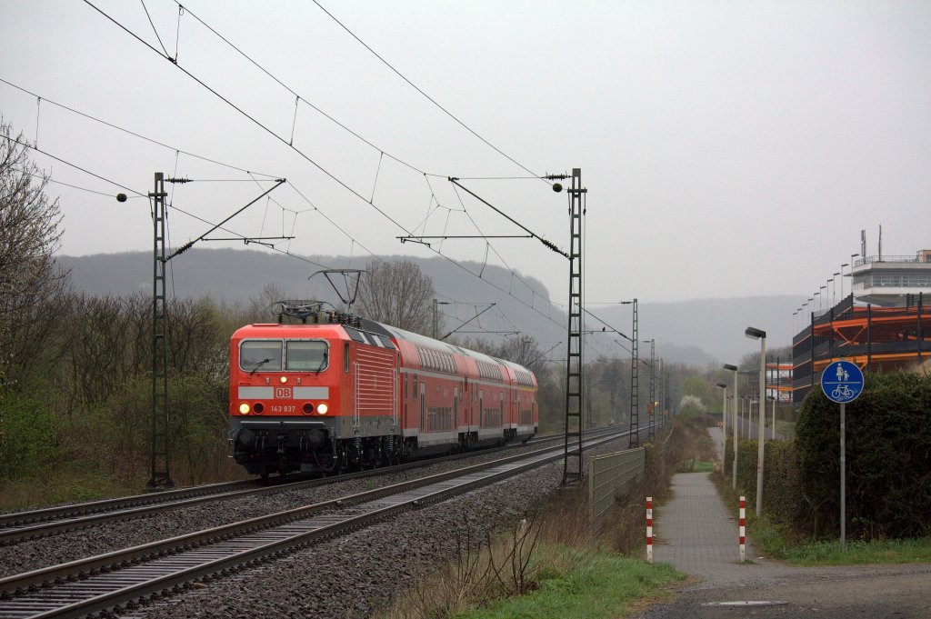 Die 143 837 frisch aus der HU als RB27 von Koblenz nach Kln Hbf am 31.03.2012 in Bonn Limperich.