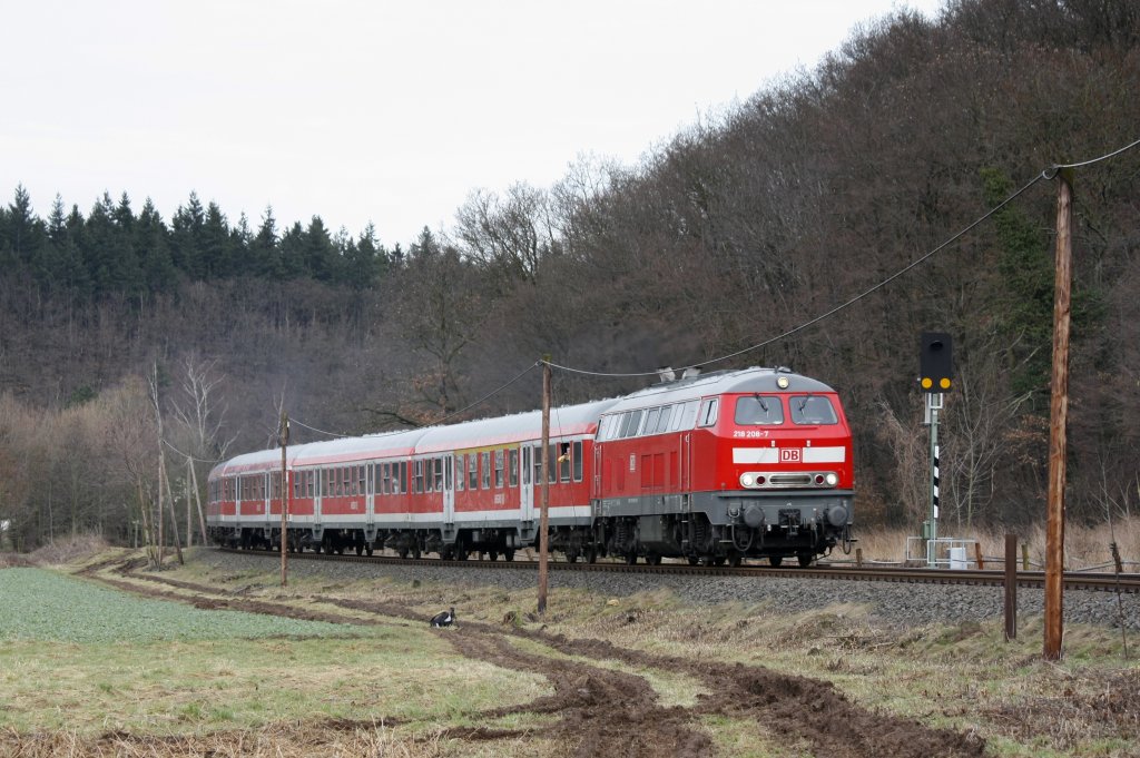 Die 218 208-7 fuhr am 15.02.2011 als RB durch Kreuzweingarten.