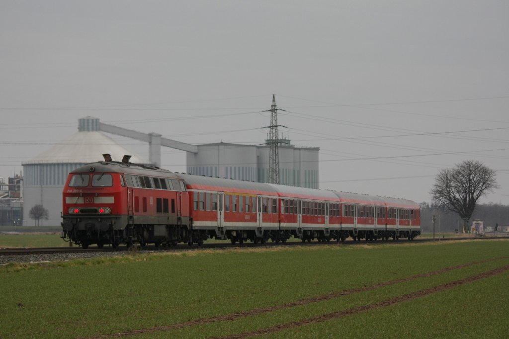 Die 218 360-6 fuhr am 14.02.2011 durch Kuchenheim, im Hintergrund ist die Zuckerfabrik, nahe Euskirchen.