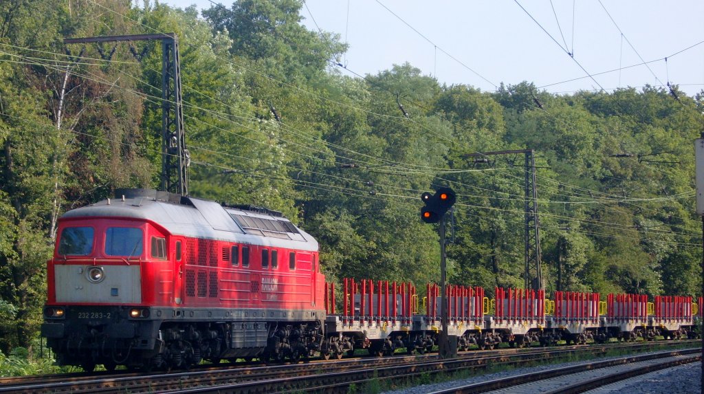 Die 232 283-2 dieselte am 10.08.2010 mit einem Leeren Stahlzug durch Duisburg Neudorf.