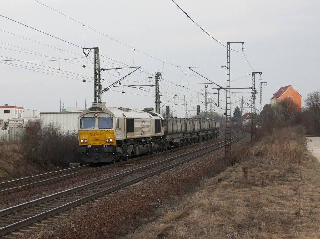 Die 247 047 am 12.03.2011 mit dem Sallerkalkzug unterwegs bei Obertraubling. 