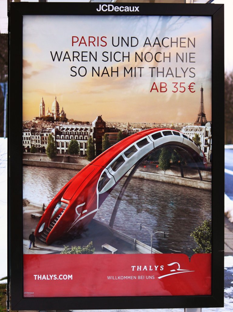Die Brcke von Aachen nach Paris. Werbung fr den Thalys am 14.03.2013 an einer Bushaltestelle in Aachen.
