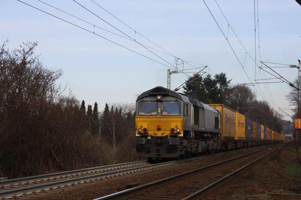 Die Class 66 von BRLL fhrt mit einem gemischten Containerzug von Aachen-West nach Belgien.
Aufgenomen am Gemmenicher-Weg.
20.3.2011