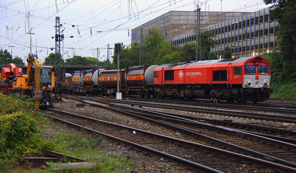 Die Class 66 DE6301  Debora  von Crossrail kommt mit einem Containerzug aus Belgien und f�hrt in Aachen-West ein am Abend des 21.9.2012.