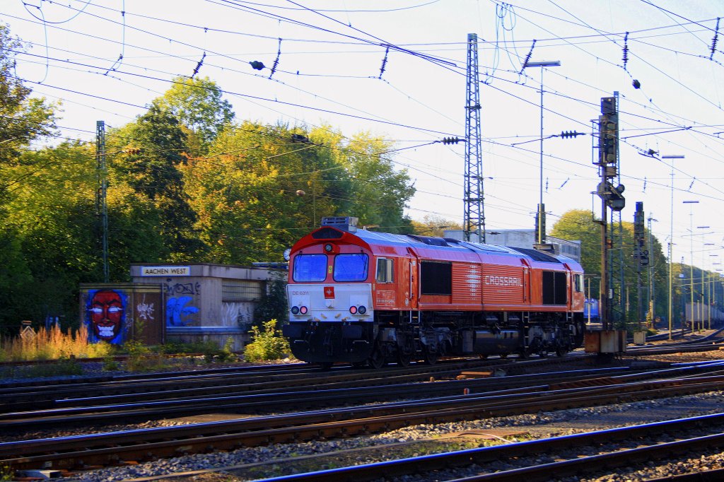 Die Class 66 DE6311  Hanna  von Crossrail kommt als Lokzug aus Montzen/Belgien und fhrt in Aachen-West ein bei sonne.
15.10.2011
