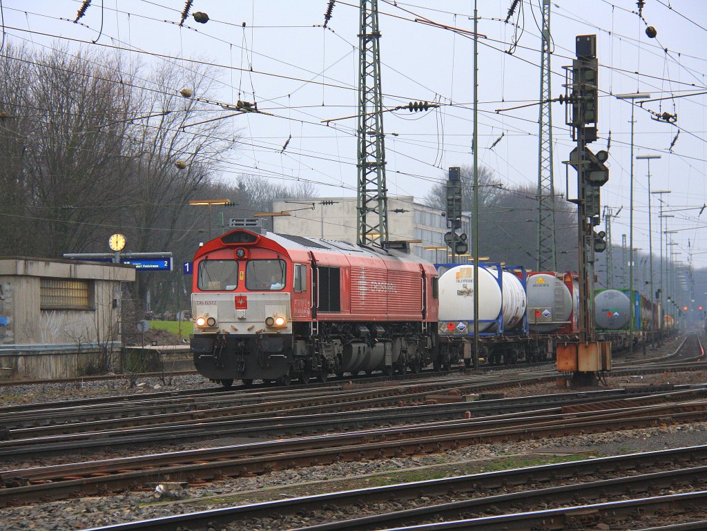 Die Class 66 DE6312  Alix  von Crossrail fhrt mit einem Containerzug von Aachen-West nach Belgien bei Abendstimmung am 3.3.2012.