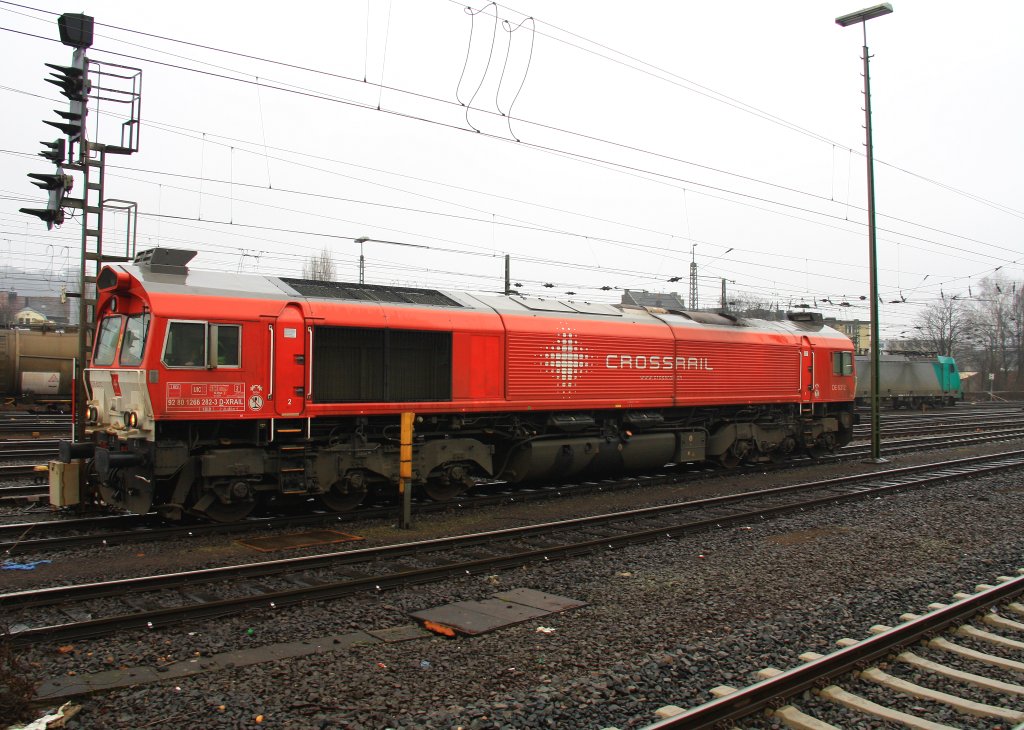 Die Class 66 DE6312  Alix  von Crossrail kommt als Lokzug aus Montzen(B) und fhrt in Aachen-West ein bei Regenwetter am 10.3.2012.
