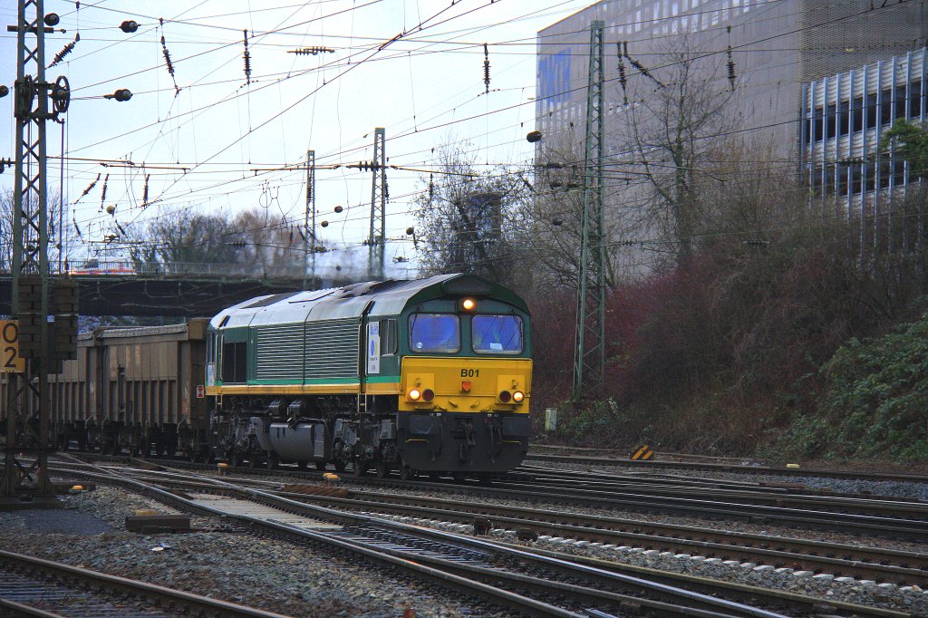 Die Class 66 PB01 von der Rurtalbahn kommt mit einem Bleizug aus Antwerpen-Lillo(B) nach Stolberg-Hammer und fhrt in Aachen-West ein bei Wolken am 30.12.2011.