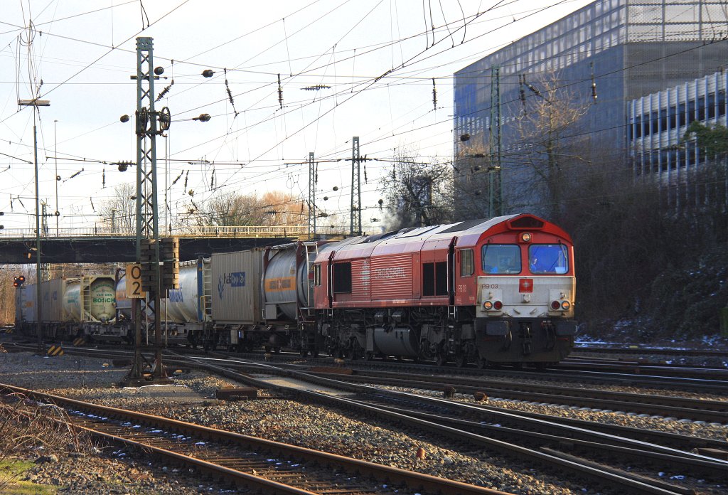Die Class 66 PB03  Mireille  von Crossrail kommt mit einem Containerzug aus Belgien und fhrt in Aachen-West ein bei Schnem Sonnenschein am Rosenmontag 20.2.2012.