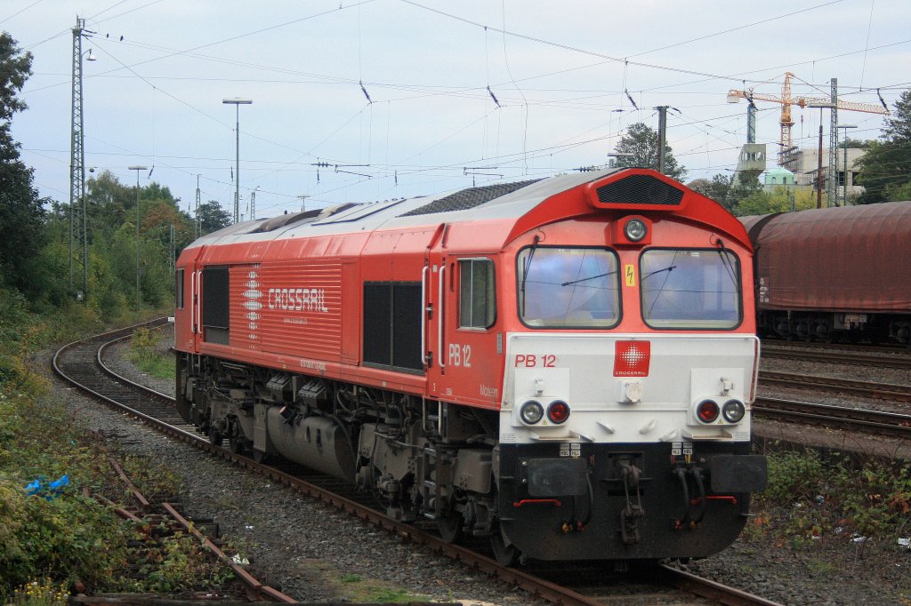 Die Class 66 PB12  Marleen  von Crossrail steht abgestellt in Aachen-West bei Sonne und Wolken.
Aufgenommen von der Laderampe des Aachener-Westbahnhofes.
21.9.2011