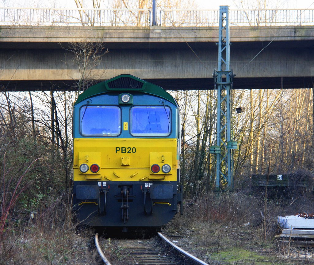 Die Class 66  PB20 von Railtraxx BVBA steht in Aachen-West auf dem abstellgleis bei schner Wintersonne am 17.2.2013.