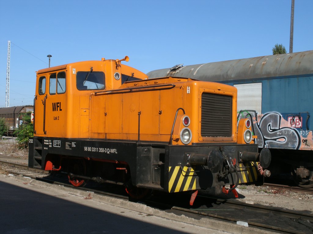 Die frhre 311 360 ist bei der WFL unter der Nr:Lok 2 im Einsatz.Aufnahme am 01.Oktober 2011 in Berlin Greifswalder Strae.