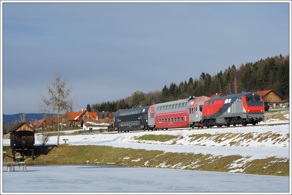 Die von Heros Rail Rent GmbH angemietet 218 117 bespannte am 14.12.2010 den R 4369 von Graz ber Werndorf nach Wies-Eibiswald. Die Aufnahme entstand kurz nach Deutschlandsberg bei den Teichen in Kresbach.