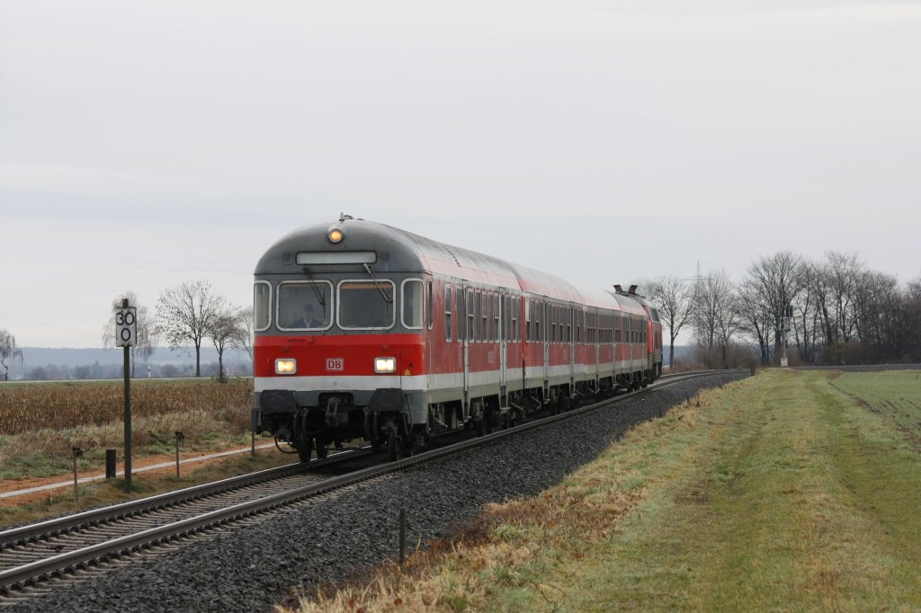 Die RB 23 fuhr am 15.02.2011 mit einer 218er und 4 n-Wagen durch Kuchenheim.