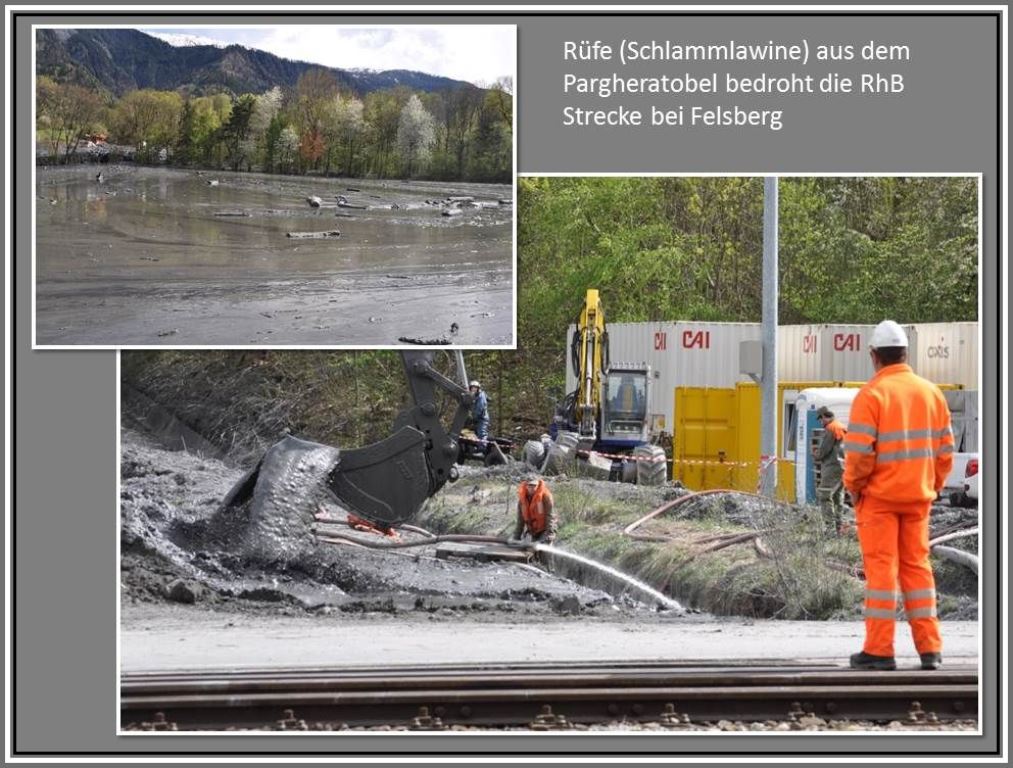Die Schlammbeseitigung durch die Armee wird vom Sicherheitsposten der Bahn berwacht. Der zhflssige Gesteinsbrei wird hier mit Wasser verdnnt in den Rhein gesphlt. Rfe aus dem Pargheratobel am Bahnhof Felsberg. (27.04.2013)
