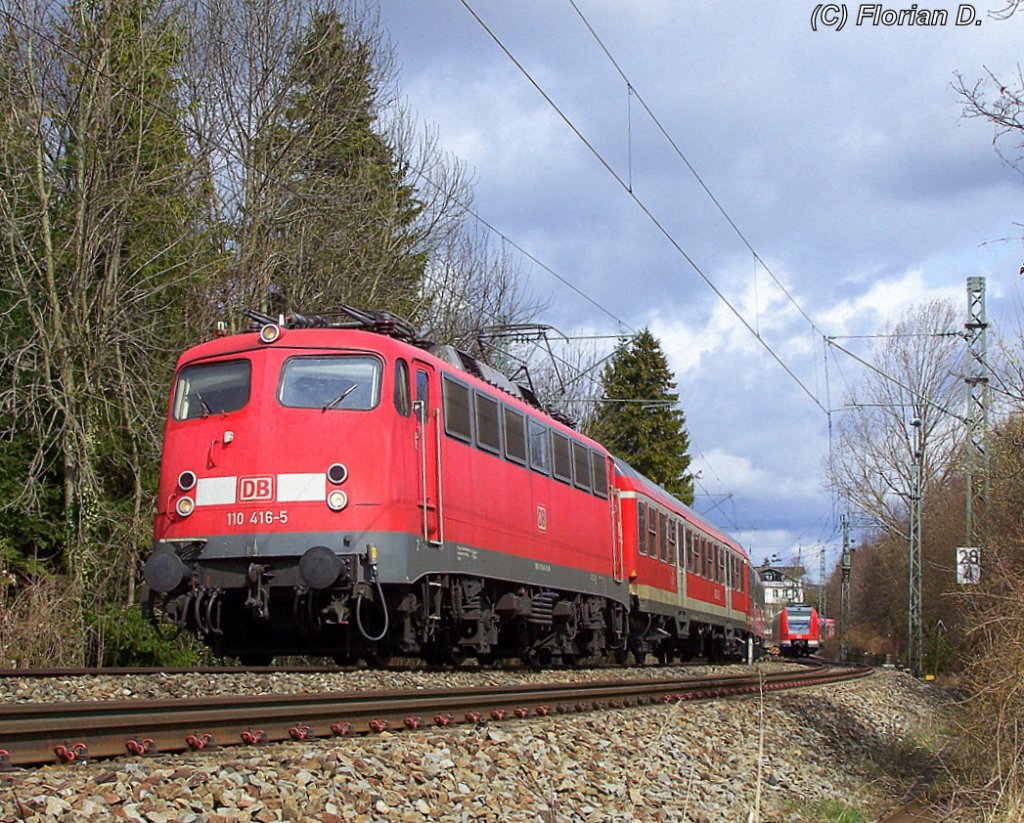 Die Stuttgarter 110 416-5 zieht Ihren RE von Mnchen nach Innsbruck Hbf durch Starnberg. 28.03.2010