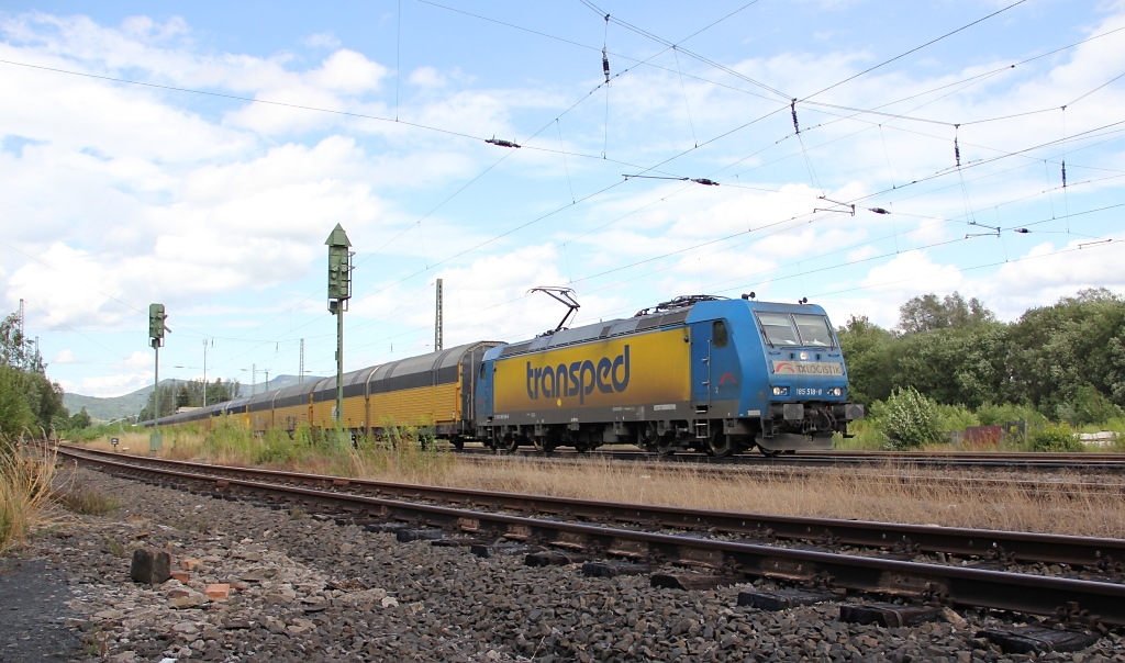 Die Transped 185 518 mit geschlossenen ARS Autozug in Fahrtrichtung Sden. Aufgenommen am 18.07.2011 in Eschwege West.
