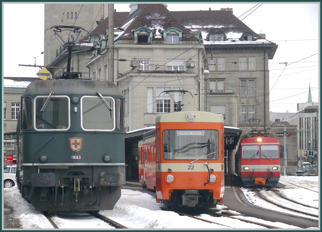 Diese Fahrzeugparade zwischen Normalspur, Meterspur schmales Profil und Meterspur Normalprofil wurde nicht wegen mir aufgestellt, man kann sie so eigentlich tglich sehen in St.Gallen. Re 6/6 11663  Eglisau  ist abgestellt auf dem Normalspurgleis beim Nebenbahnhof, wo BDe 4/8 22 der Trogenerbahn auf einen Verstrkungseinsatz wartet. Daneben steht BDeh 4/4 11 der Appenzeller Bahnen bereit zur Fahrt nach Gais und Appenzell. (21.12.2010)