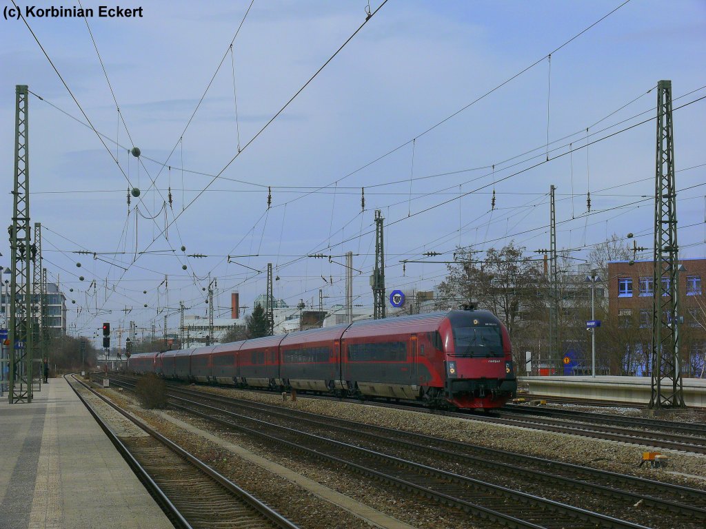 Doppeleinheit Railjet als RJ67 nach Budapest bzw. Wien Westbahnhof bei der Durchfahrt am Heimeranplatz, 20.03.2010