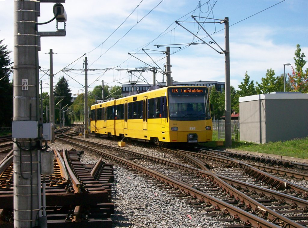 DT 8.10 3305/3306 Kurs: 05-03 als U5 Leinfelden kurz nach Ausfahrt Stuttgart-Mringen   Bf Richtung Stuttgart Vaihingerstrae am 06.09.2011. (Name/Wappen: Stgt,-Sillenbuch.)