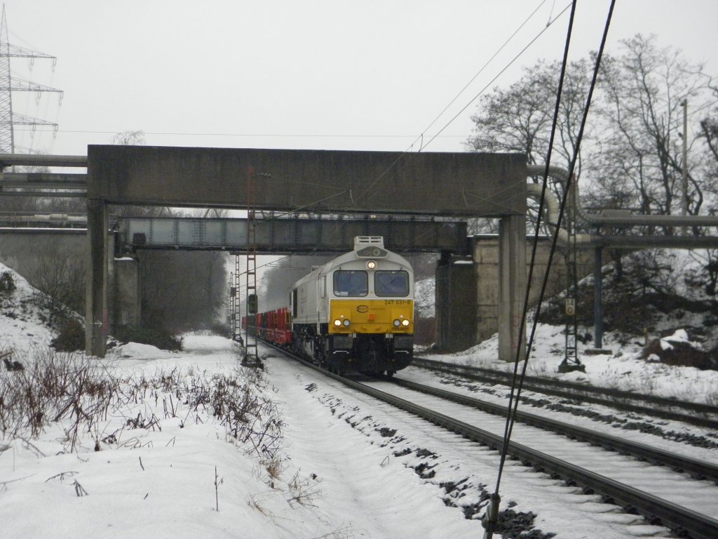 ECR Class 77 mit Rungenwagen in Bottrop am 6.1.11. ffentlich zugnglich durch einen Wanderweg