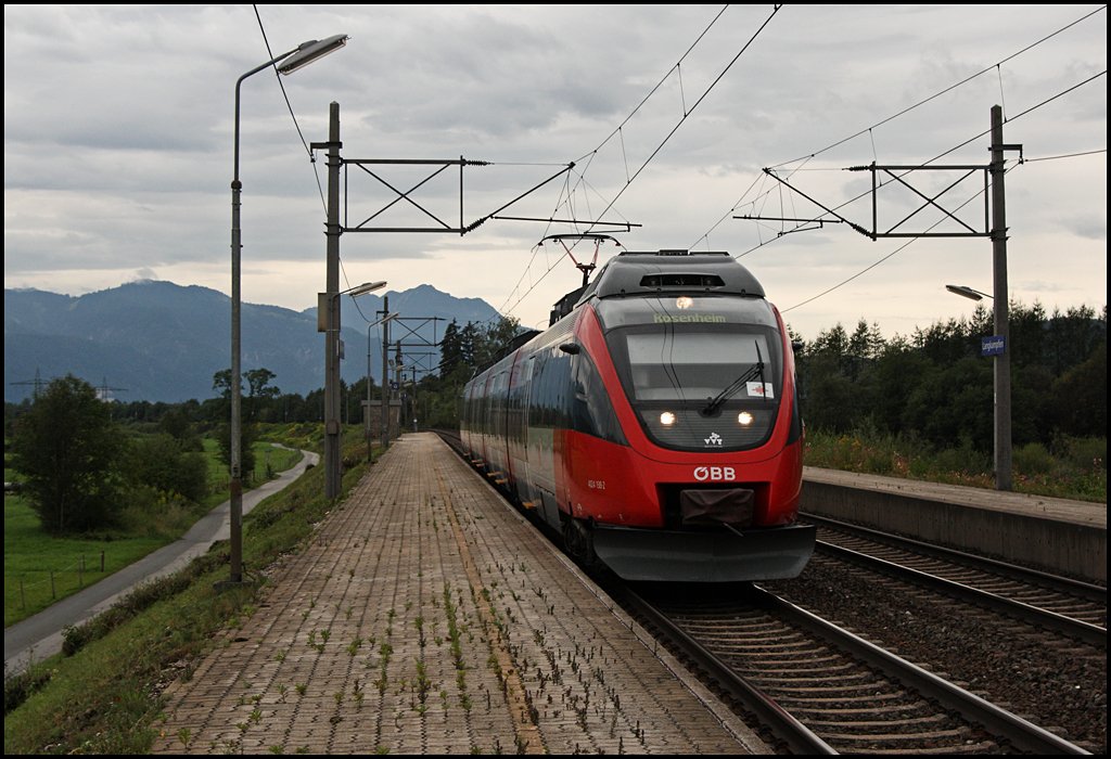 Ein 4024er erreicht als Regionalzug auf dem Weg nach Rosenheim den Haltepunkt Langkampfen im Inntal. (10.08.2009)