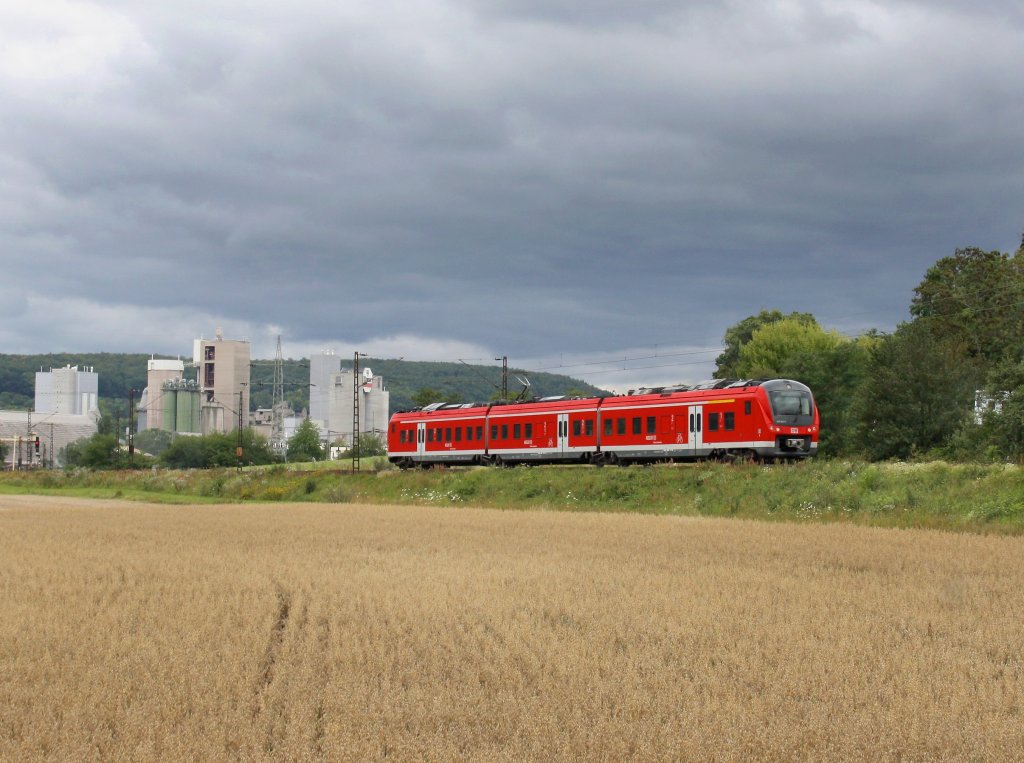 Ein 440 als RB nach Wrzburg am 30.07.2011 unterwegs bei Karlstadt. 