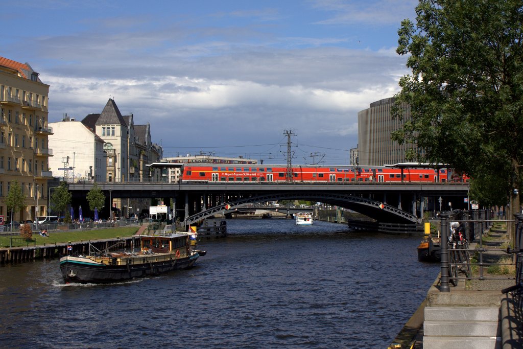 Ein Airport-Express Schnefeld Steuerwagen am 30.07.2012 als RE an der Berliner Friedrichstrae.