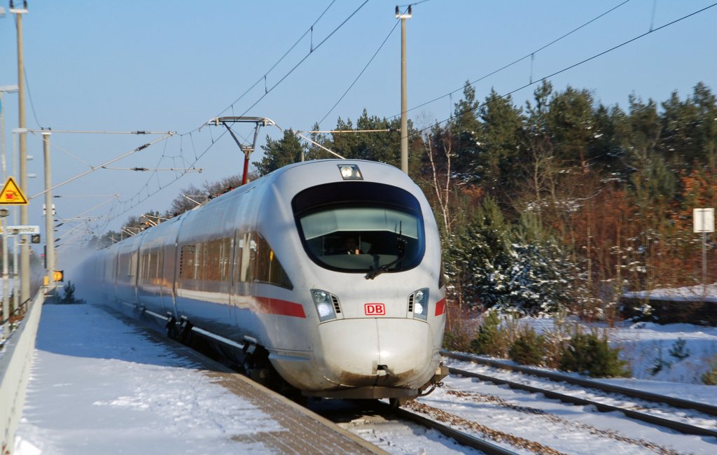 Ein ICE-T der BR 411 durchfhrt am 04.12.10 Burgkemnitz Richtung Leipzig...