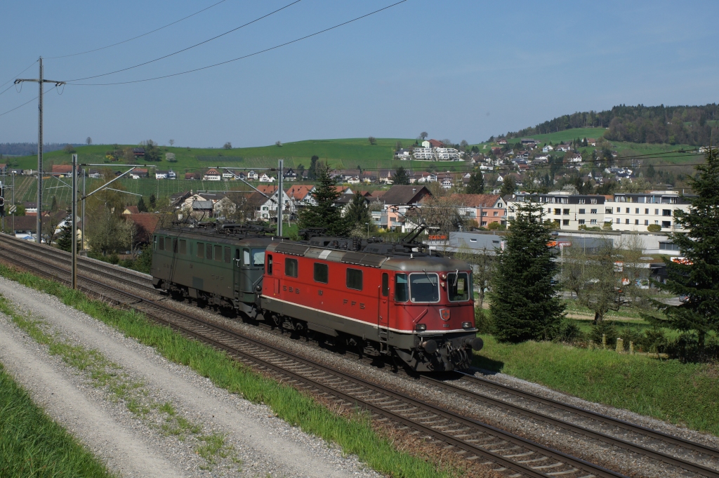 Ein Lokzug bestehend aus der Re 4/4 II 11167 und der Ae 6/6 11427 verlsst am 24.04.2013 Eglisau und macht sich auf den Weg Richtung Blach. 