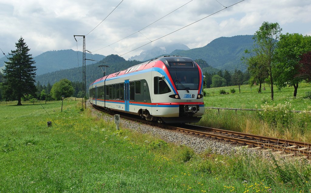 Ein Stckchen weiter kam uns der Gegenzug entgegen. ET 133 in Richtung Bad Reichenhall. Aufgenommen am 15.07.2010.