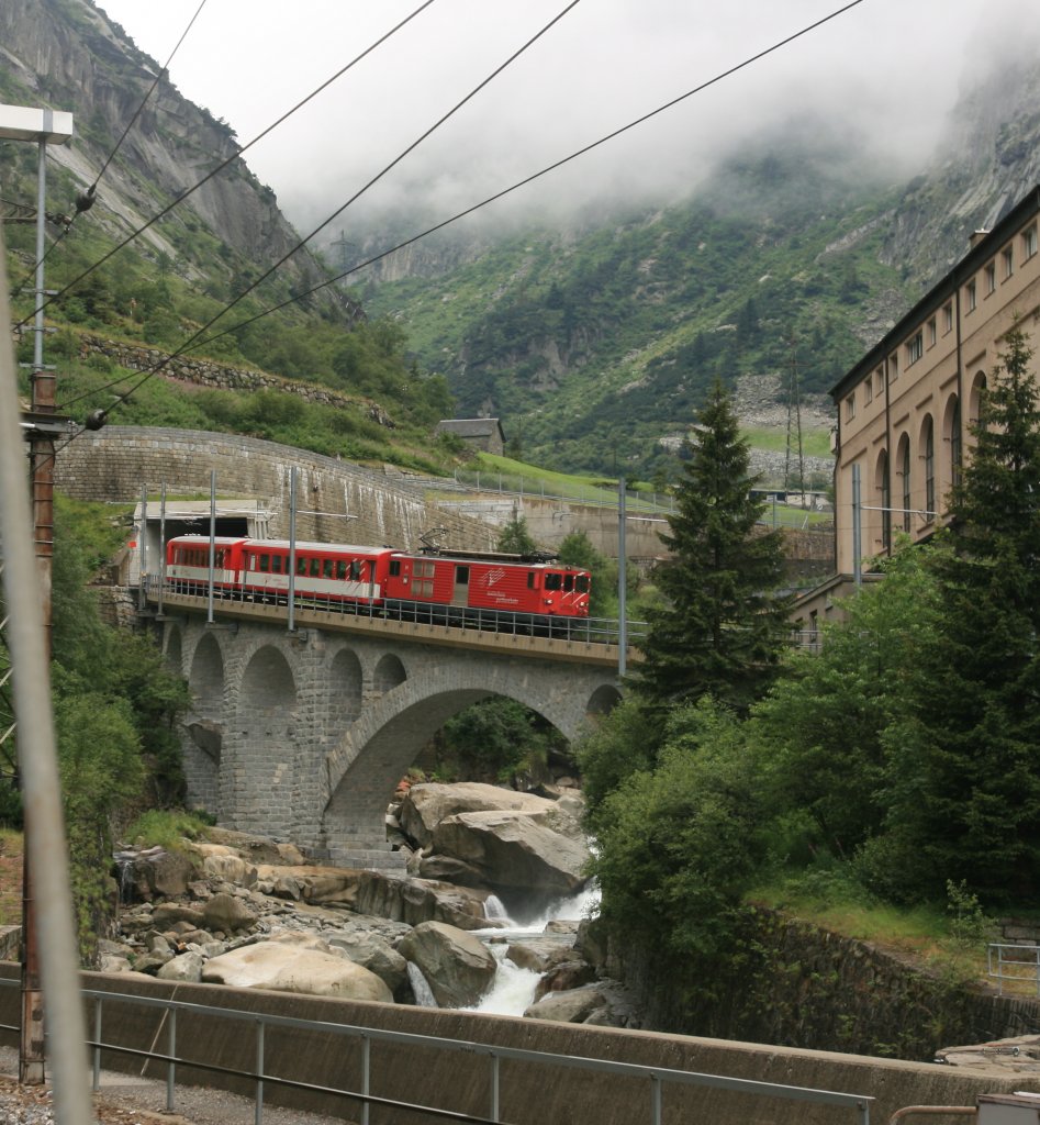 Ein zug der MGB (Matterhorn Gotthard-Bahn) fahrt am 27. Juli 2010 in Bahnhof Gschenen ein.
So besser, Stefan? :D