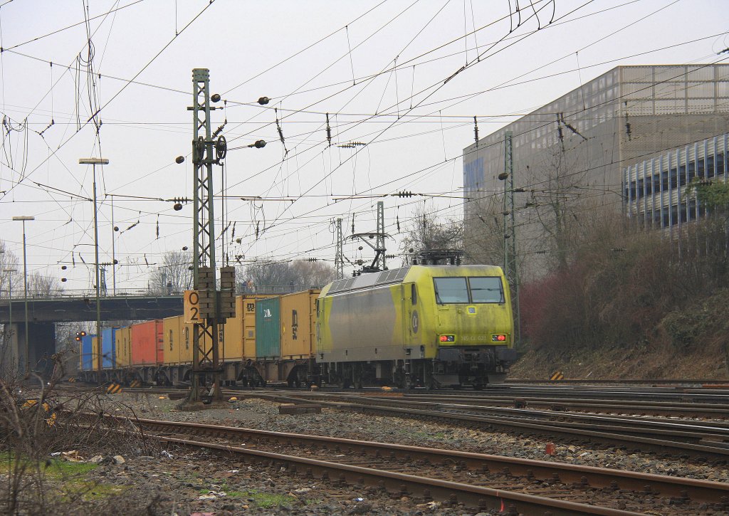 Eine 145 CL-031 von Alpha Trains als Schubhilfe fr einen sehr langen Containerzug von Aachen-West in Richtung Belgien bei Wolken am 13.3.2012.